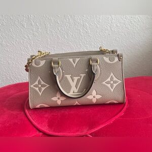 Authentic Louis Vuitton OnTheGo East West Tote.